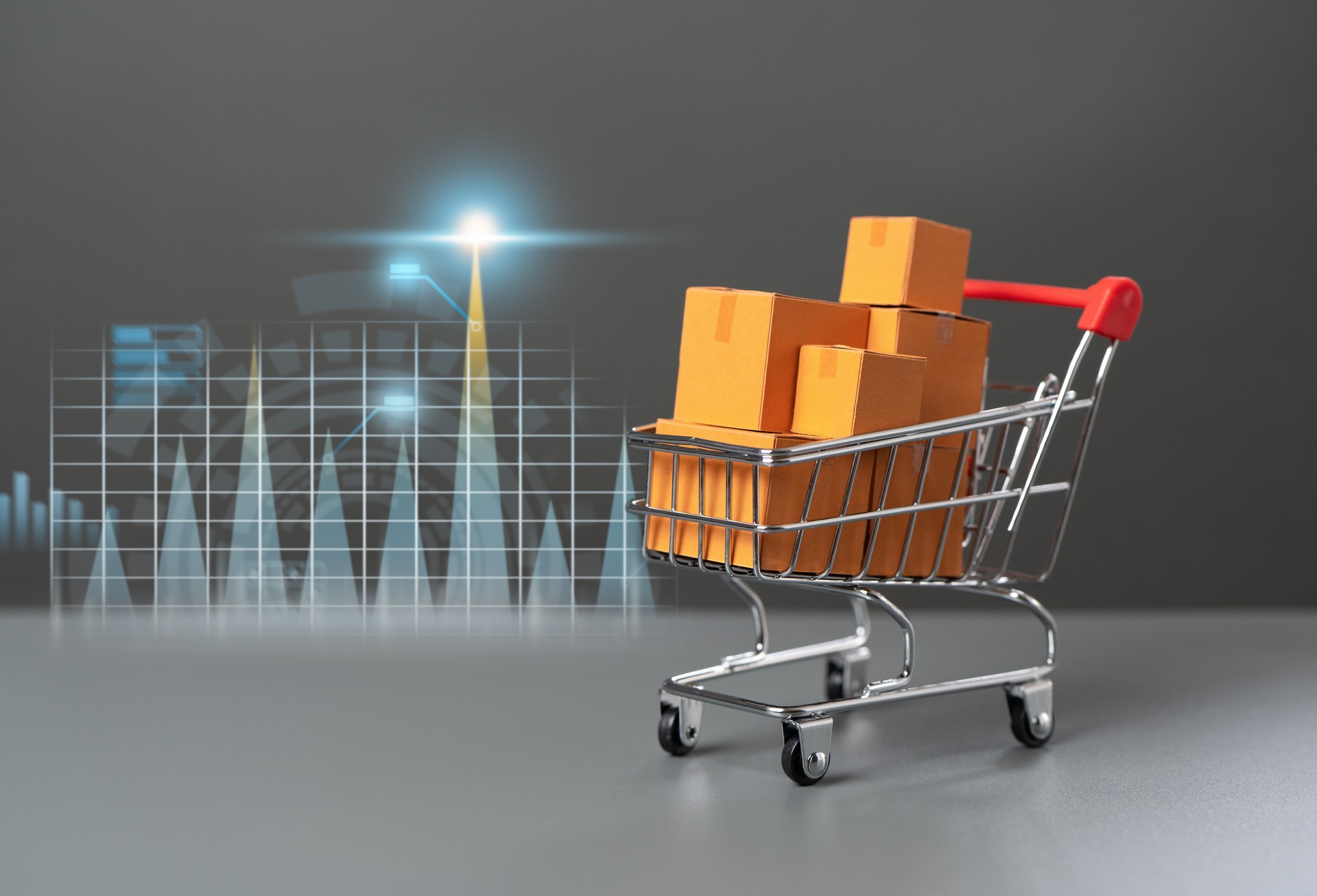 Supermarket cart with boxes of goods and graphs of growth of economic indicators. Sale of goods profit. Marketing and market research. Purchasing power of buyers. Business strategy development.